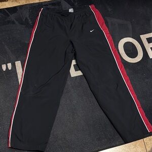 Nike Black Track Pants with Red Stripes